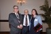 Dr. Nagib Callaos, General Chair, giving Dr. Ronald A. Styron, Jr. and Dr. Jennifer Styron an award and a plaque, respectively, "In Appreciation for Delivering a Great Keynote Address at a Plenary Session."